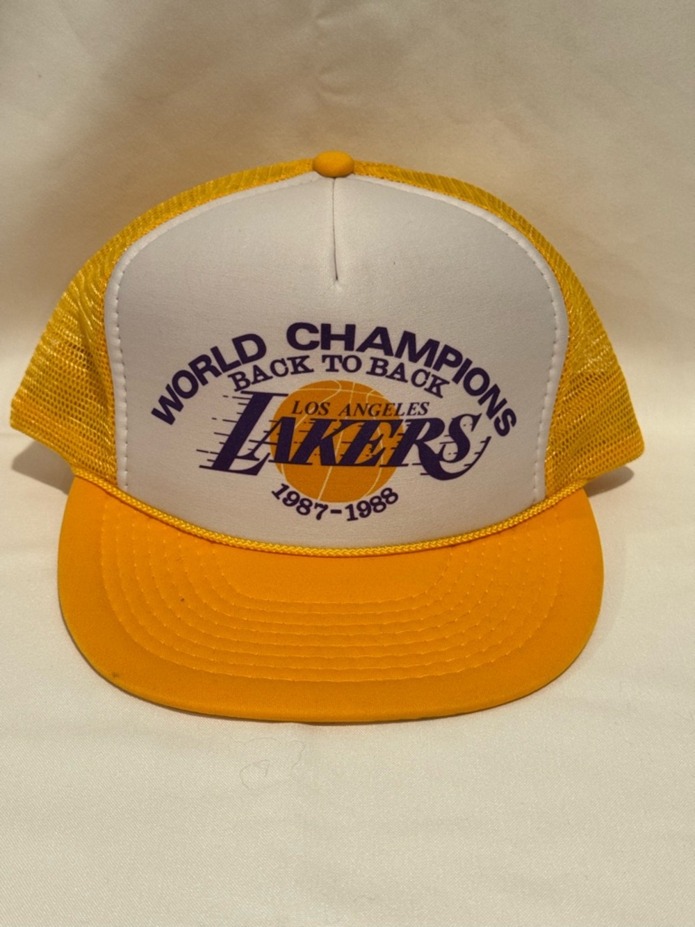 Vintage 1980’s Los Angeles Lakers World Champions Trucker Hat - Yellow & White